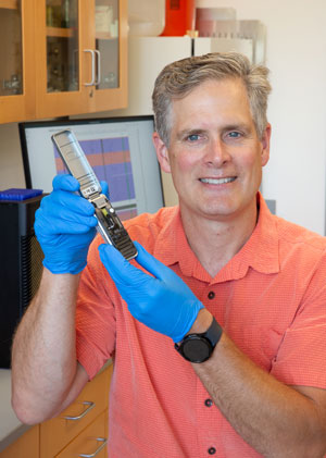 Dr. Scott Ferguson, with the Nanopore DNA Sequencer.