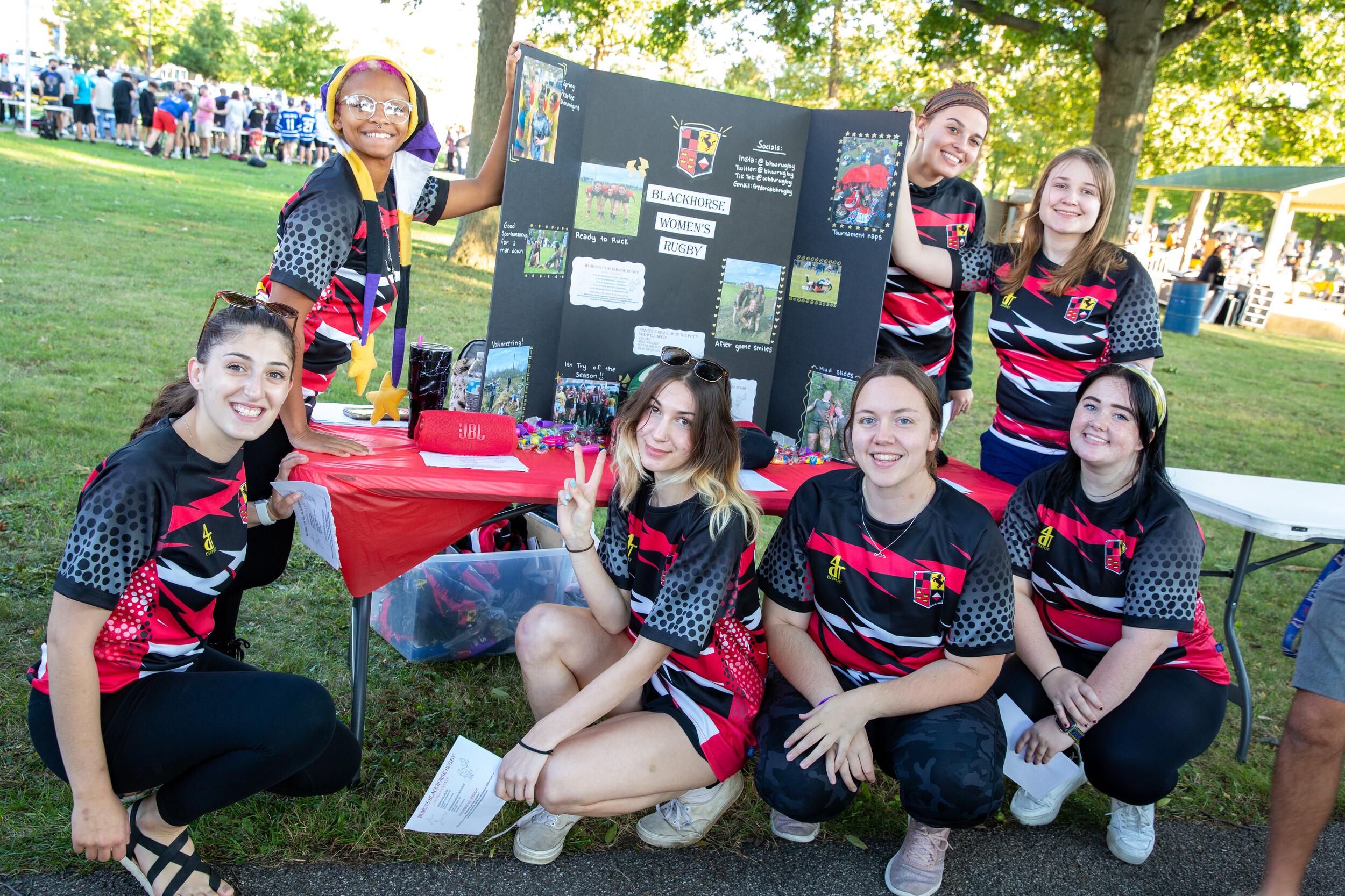 The Fredonia Women's Rugby Team at Activities Night encouraging students to join.