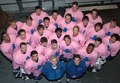 Hockey team in pink jerseys