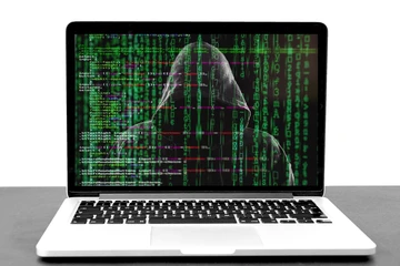 fictional image of a hacker on a computer