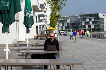 guy working remotely on a computer