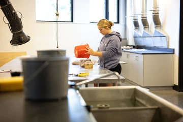 student in sculpture class. Fredonia students earning a sculpture degree work in a hands-on environment. Sculpture program, sculpture major, major in sculpture