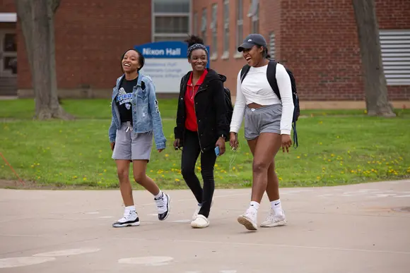 Fredonia students enjoying the weather during a walk through campus 