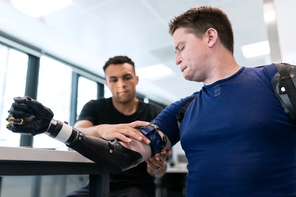 Therapist working with patient. Exercise Science program graduates develop skills that lead to rewarding careers helping others. 