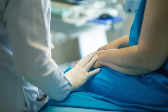 doctor treating patient