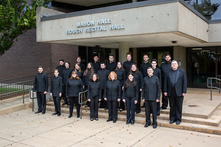 photo of the choir standing outside of Mason Hall