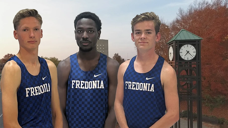 runners standing in front of background of clock tower