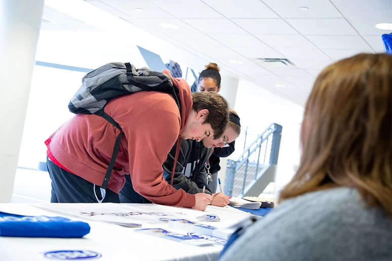 students writing thank you notes to benefactors