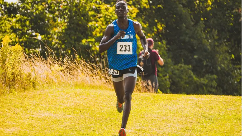 cross country runner Sembel Koshi in action, men's cross country