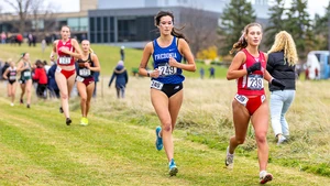 female cross country runners on the course