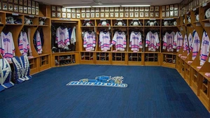 locker room with Pink the Rink jerseys