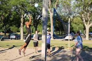 Students playing volleyball