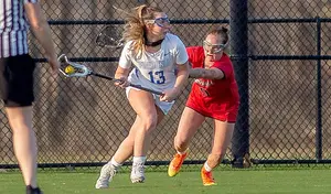 students playing lacrosse