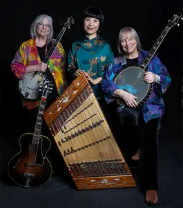 GRAMMY winners Cathy Fink (left) and Marcy Marxer (right), with Chinese musician Chao Tian, will offer a free workshop for School of Music students and the community at the School of Music on Sunday, Nov. 12.