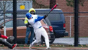 Garrett Stuckey hitting baseball