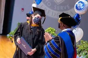 student congratulated by president