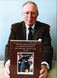 Dan Reiff with copy of family history book