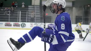 Xavier Fortin on the ice after scoring a goal