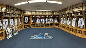 locker room with hockey jerseys