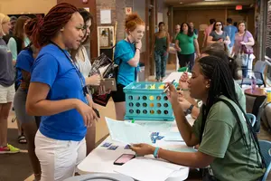 students checking into residence halls