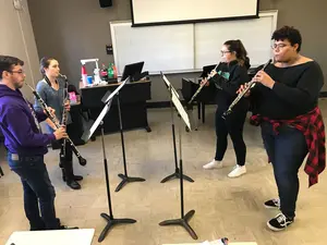 students playing several types of oboes