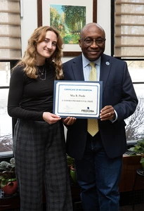 Lanford Presidential Prize recipient Mia Piede, with President Stephen H. Kolison Jr.