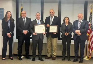 police officers and state officials with certificates