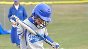 softball player at the plate