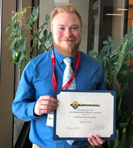 Alexander Green, with Oral Presenter certificate,