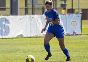 Nicki Barlow playing soccer