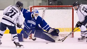 Eric Bogart extends to make a save