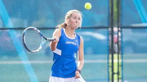 player Avril King on tennis court