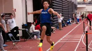 athlete jumping, men's track and field