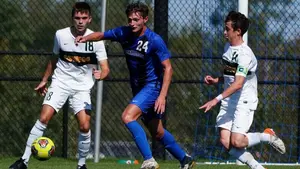 men playing soccer