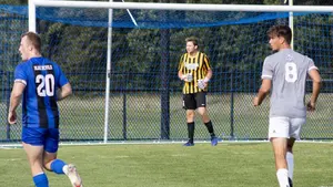 men's soccer team playing