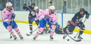 Victor Tracy skates up ice vs. Potsdam