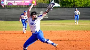 Mack Celauro throwing softball