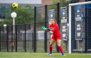 soccer goalie saves shot