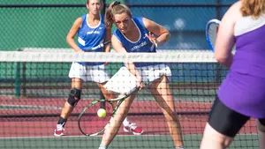 women playing tennis