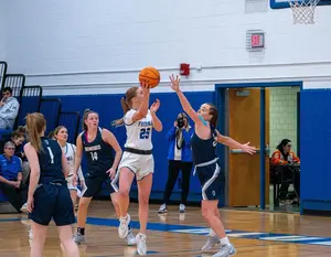 women basketball players on the court