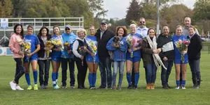 Senior soccer players and their families