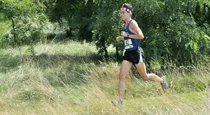 Ethan Francis wins cross country race