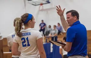 Volleyball player Emily Jones and Coach Geoff Braun