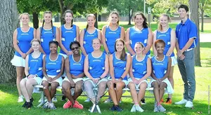 Women's tennis team with Coach Matt Johnson