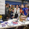 students at a sign up table at Activities Night