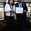 Amy Li with President Stephen H. Kolison Jr.