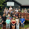 Learning Center tutors standing in front of the College Lodge.