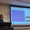 Dr. Junaid Zubairi presents a slide during the research seminar he held at Kennesaw State University in Atlanta.