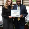 Lanford Presidential Prize recipient Mia Piede, with President Stephen H. Kolison Jr.