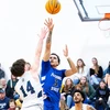 basketball players in action in Dods Hall